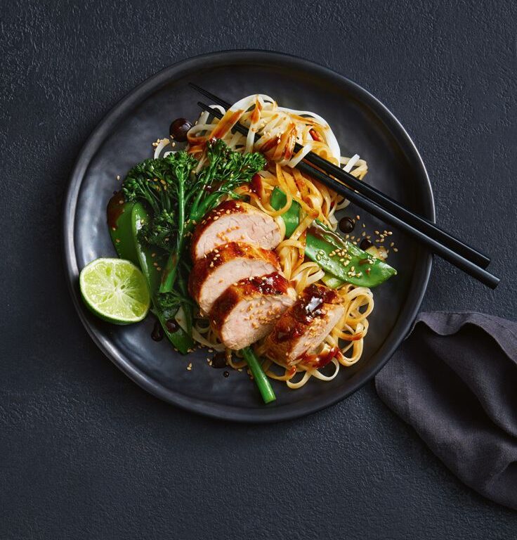 Healthy pork stir-fry with rice noodles and broccolini